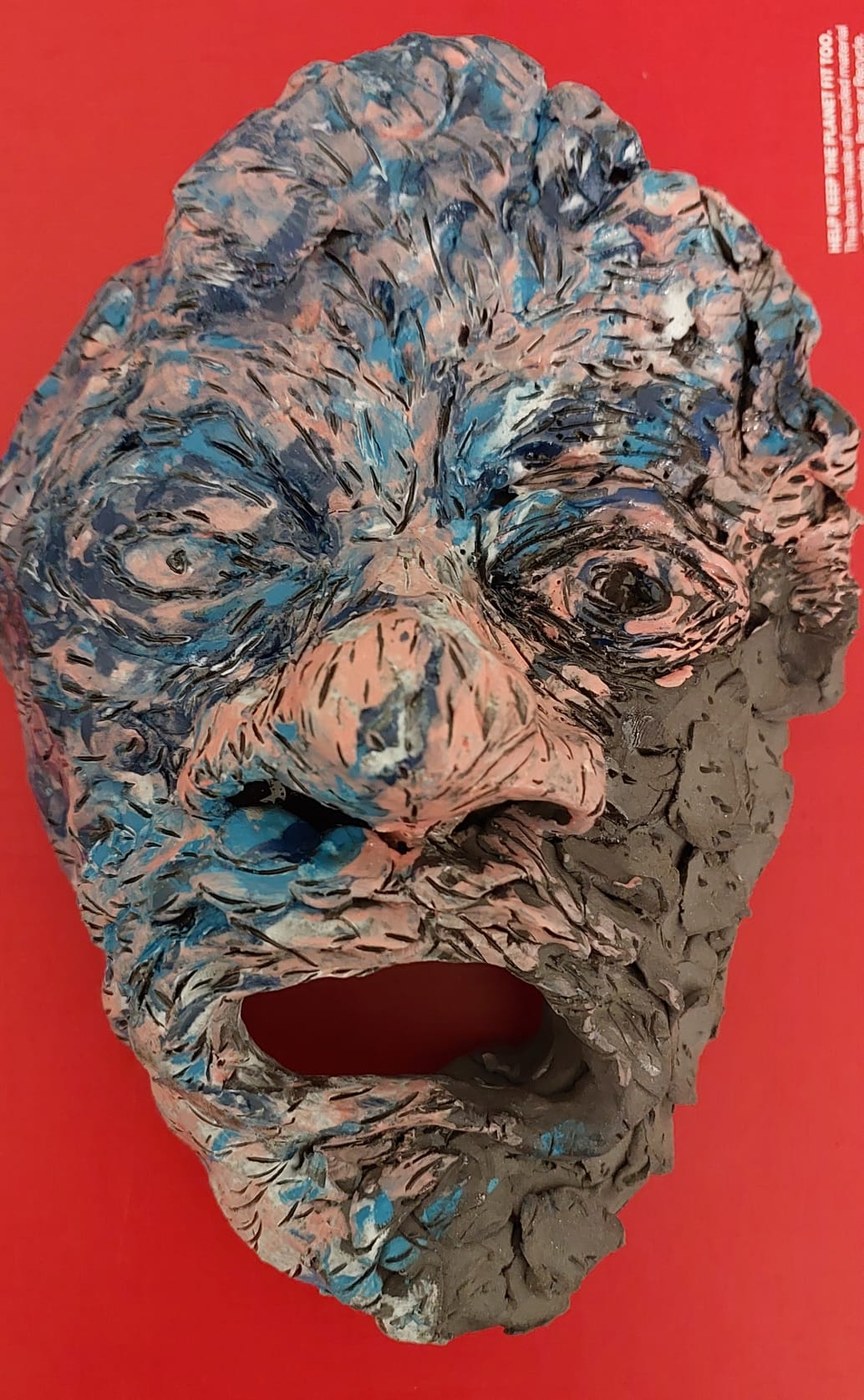 Hand-sculpted and painted ceramic mask