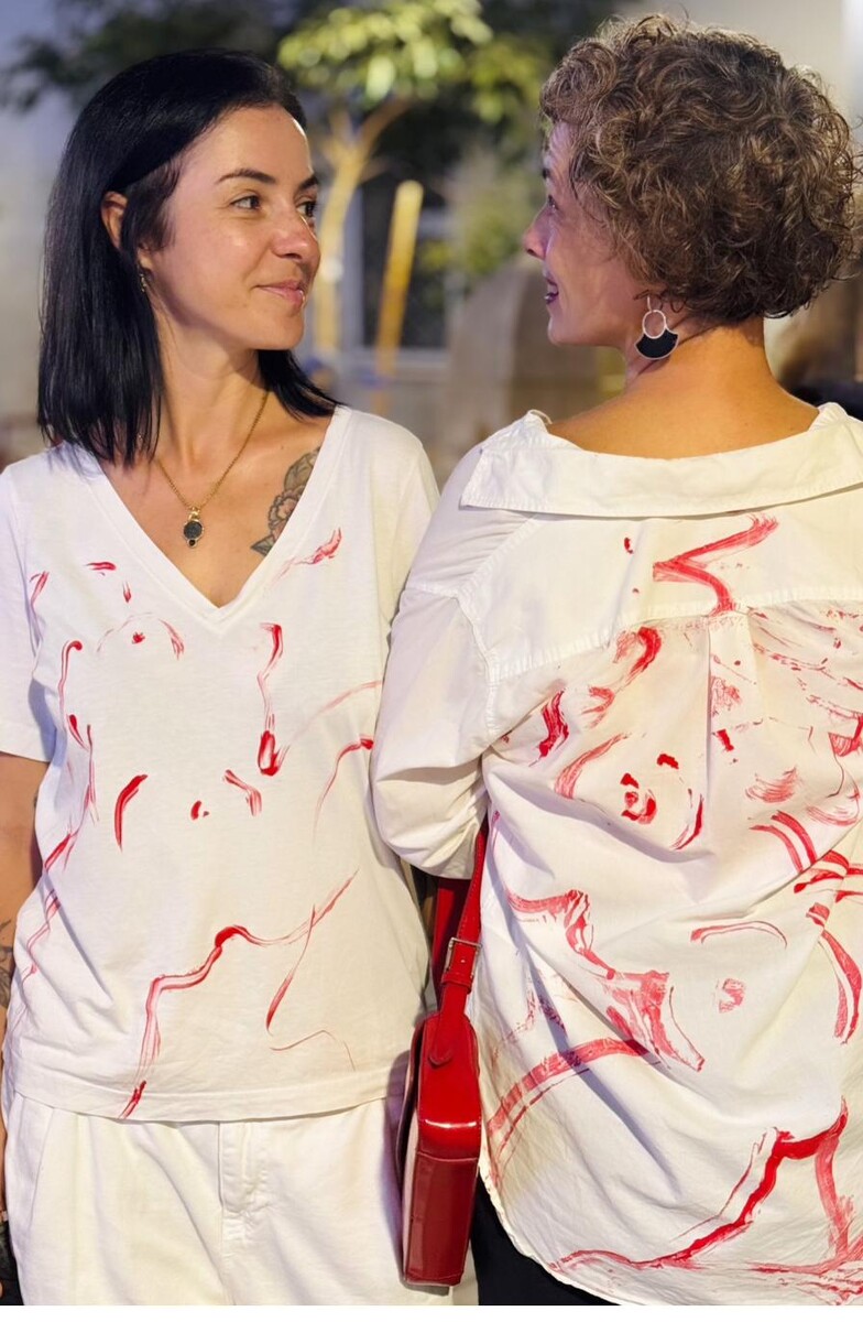 Monotype-printed shirts, two people